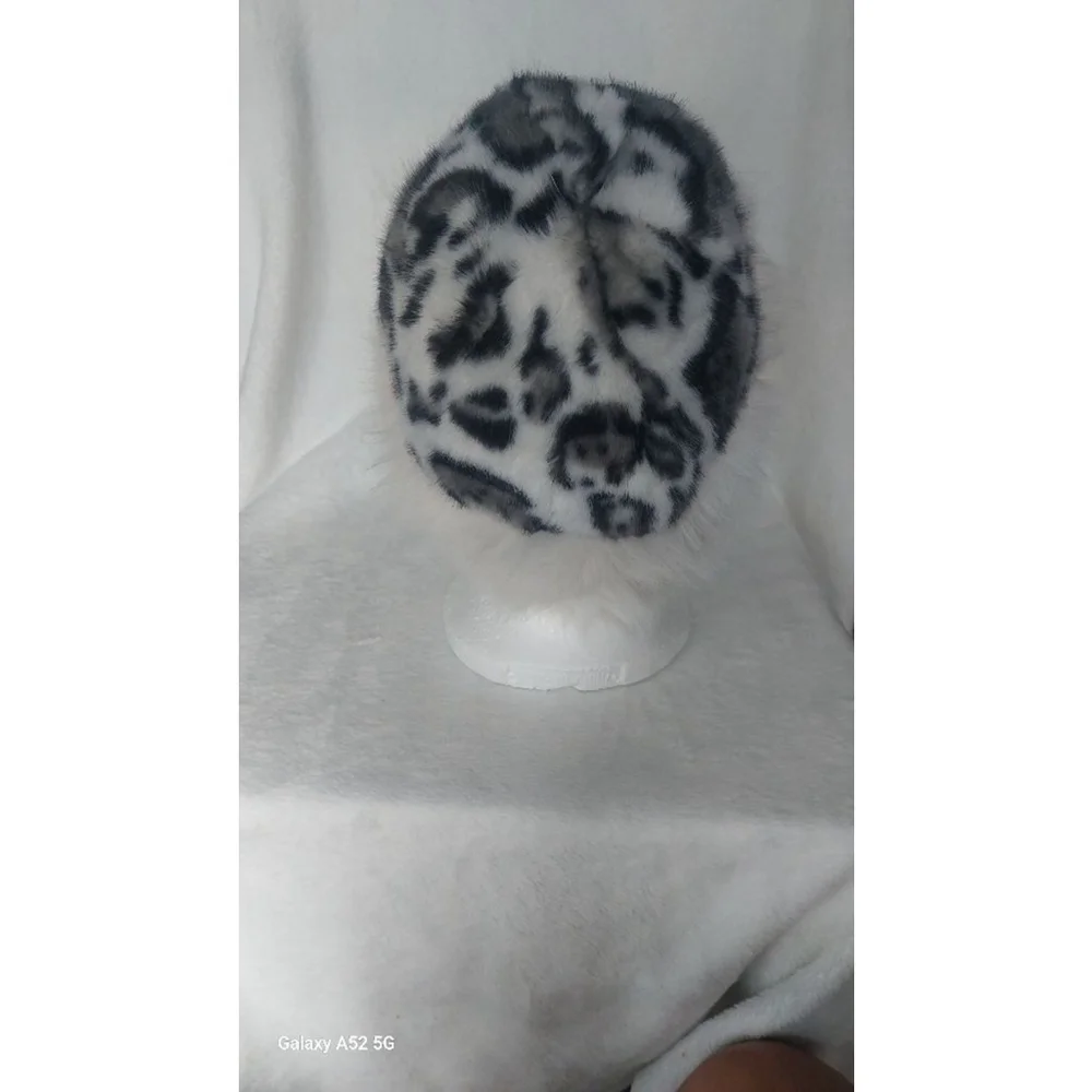 Enjoy Wild Elegance with this Faux Fur Leopard Print Hat White and black